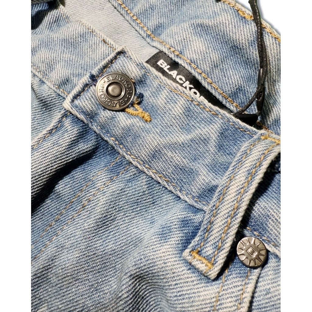 Dirty light blue baggy jeans